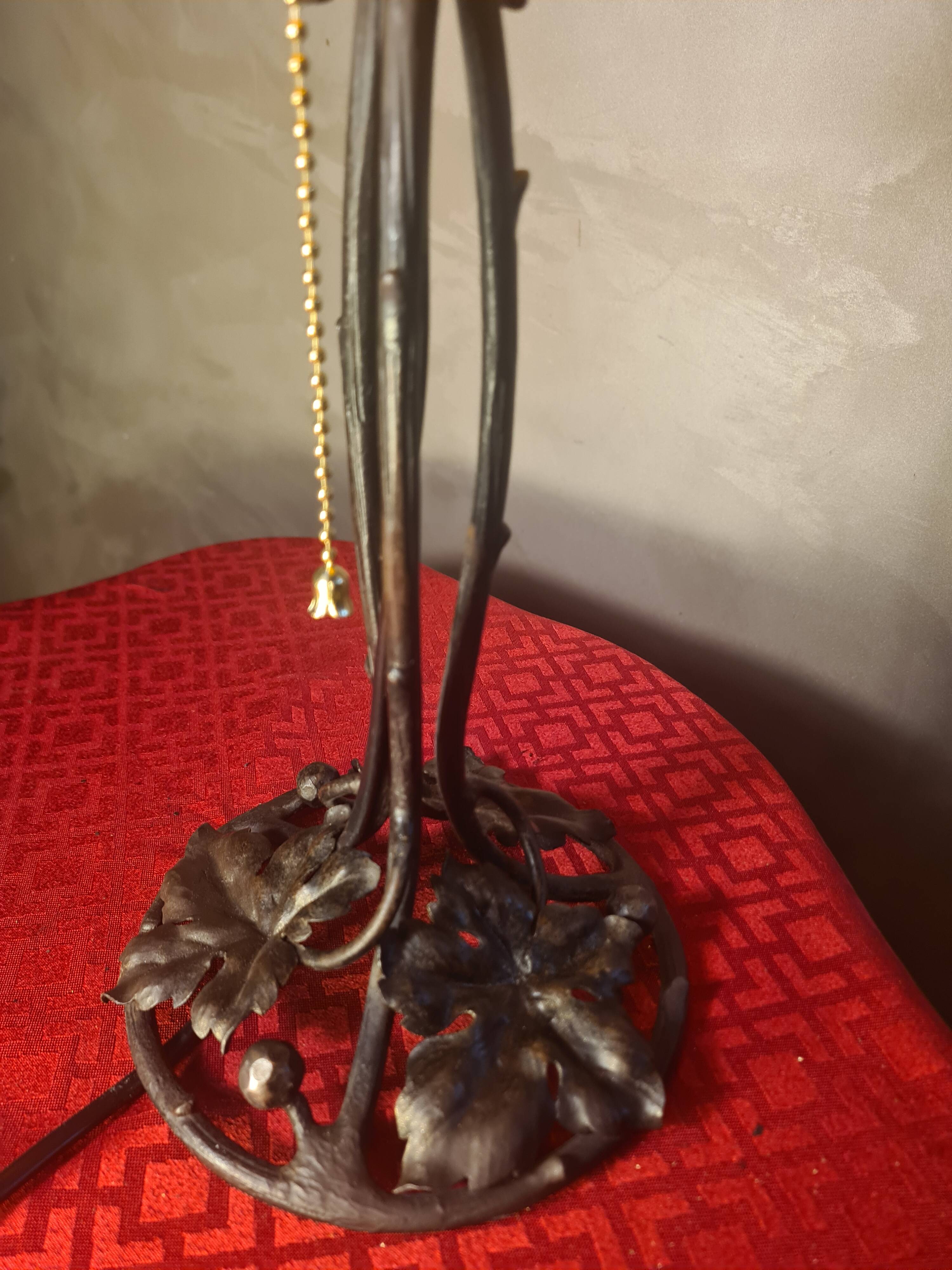 antique wrought iron lamp from 1900 at 40 with a very large glass paste shade 45