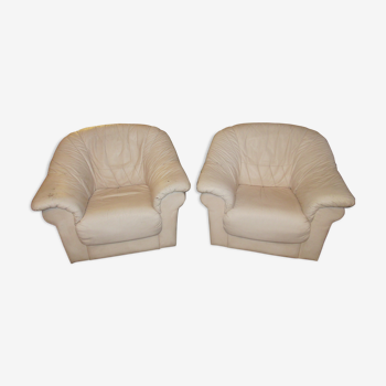 Pair of white leather armchairs