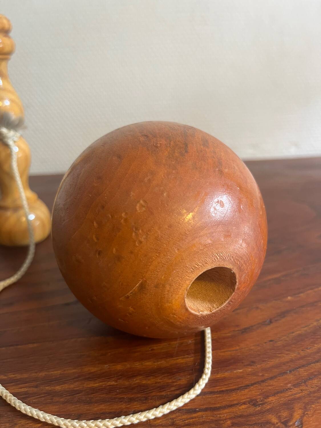 Wooden cup and ball game