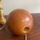 Wooden cup and ball game