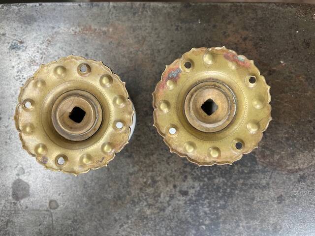 pair of round porcelain and copper Art Deco handles