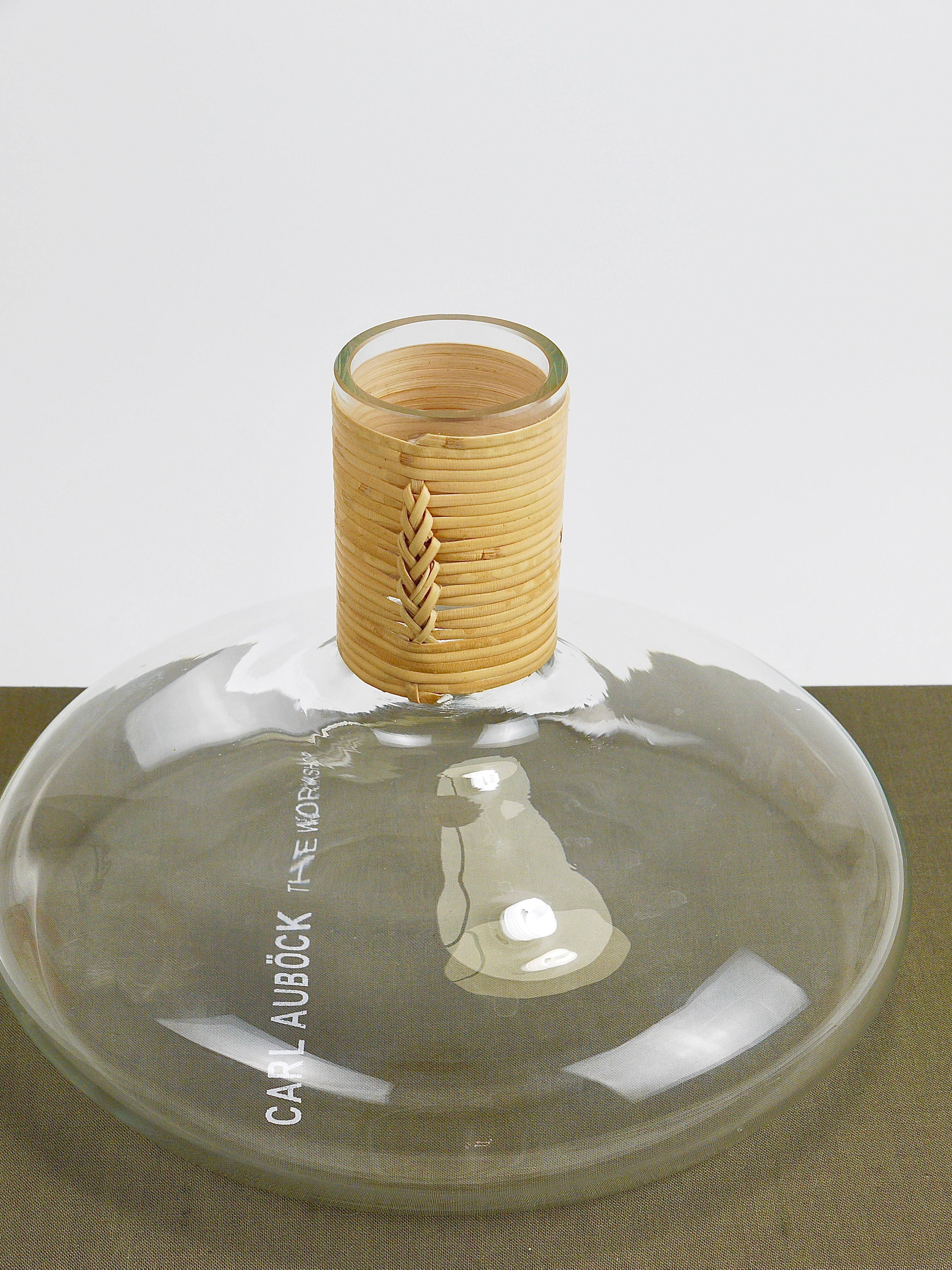 Vase by Carl Auböck decanter "Tuberkulinkolben" tall in rattan, Austria, 1950s.