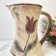 Ceramic pitcher from Les grottes dieulefit with floral pattern from the 1970s