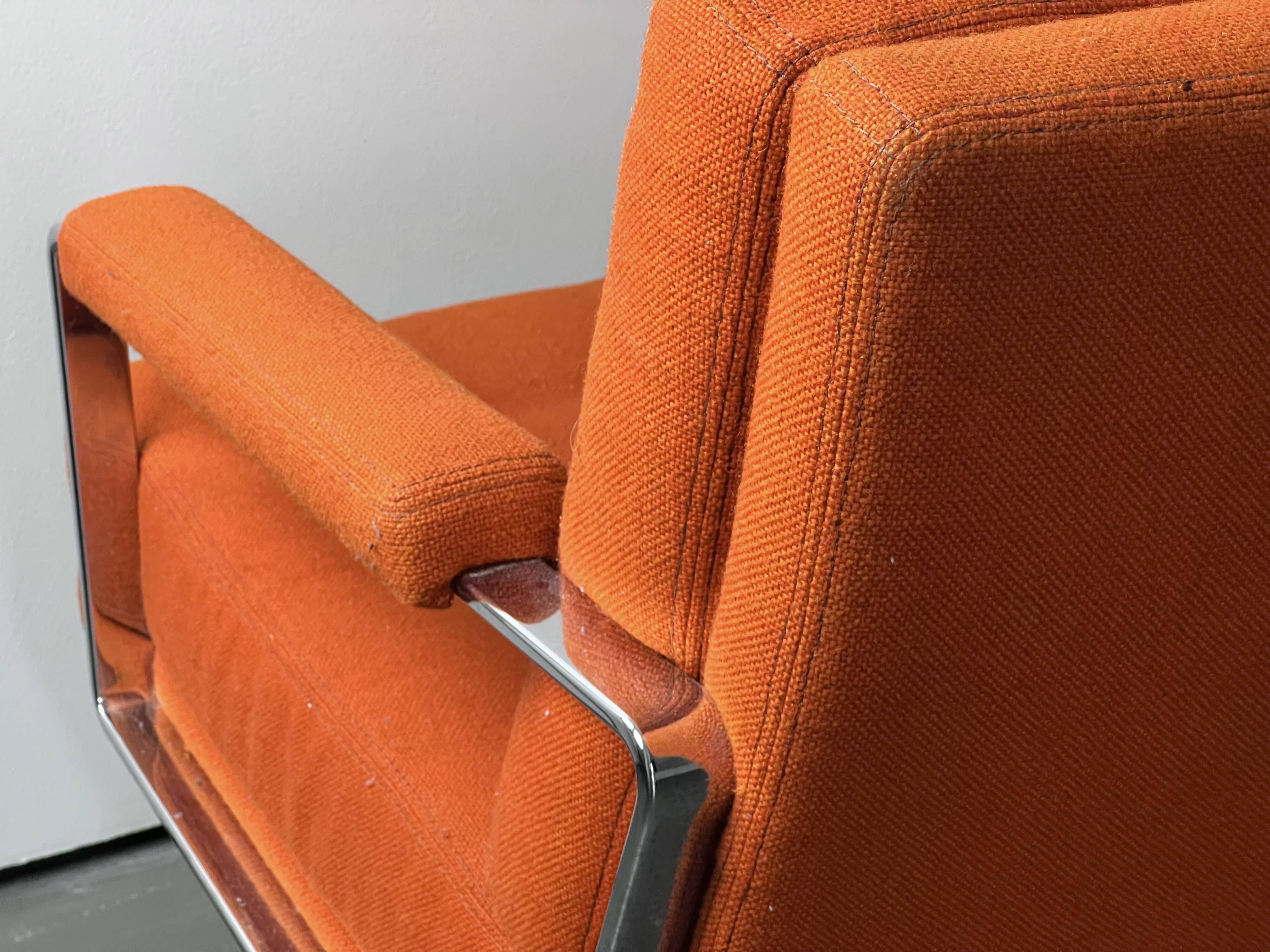 Pair of Karl Erik Ekselius armchair, in orange and chrome Kadrat fabric