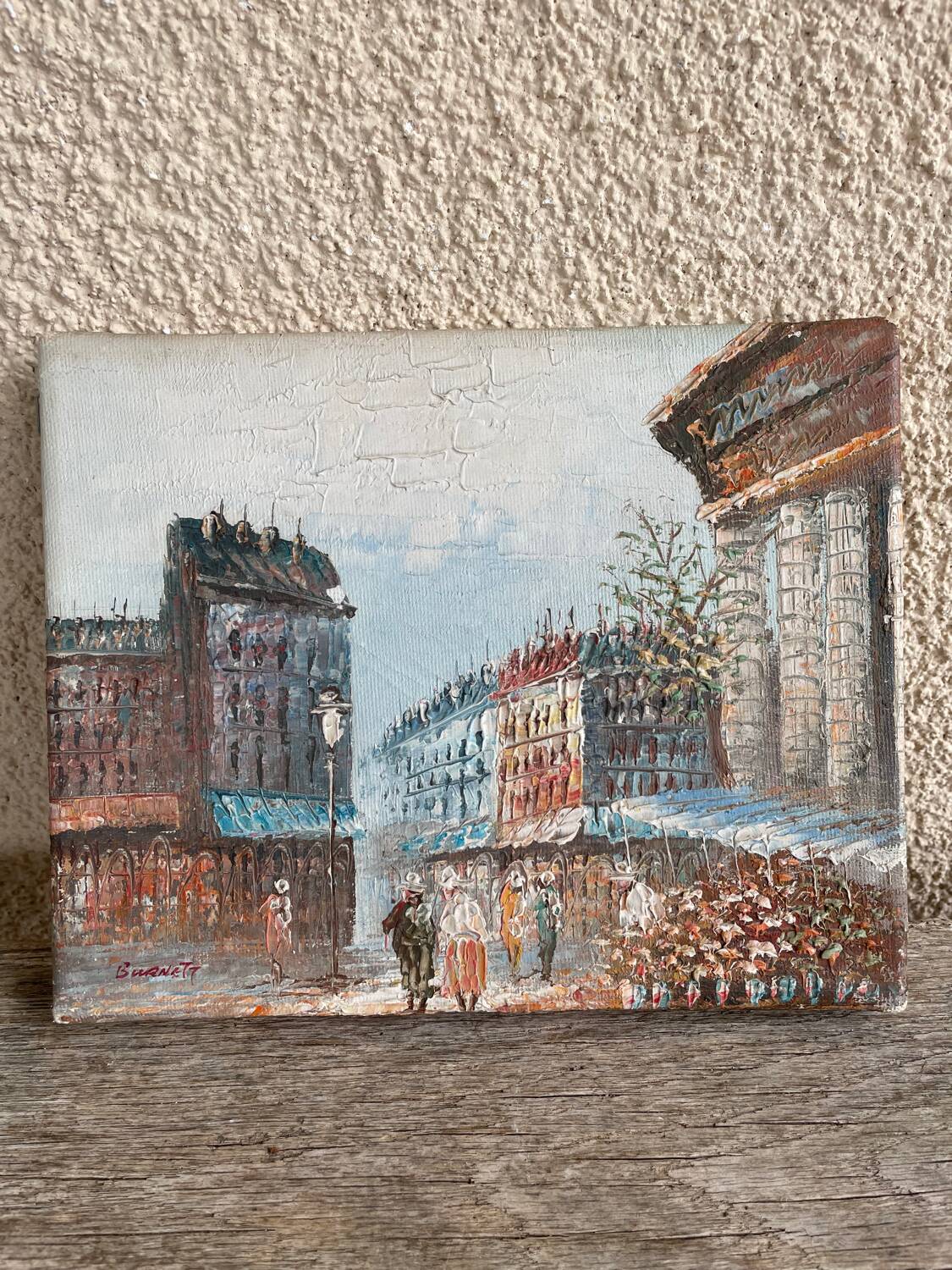 Oil painting of a Parisian scene.