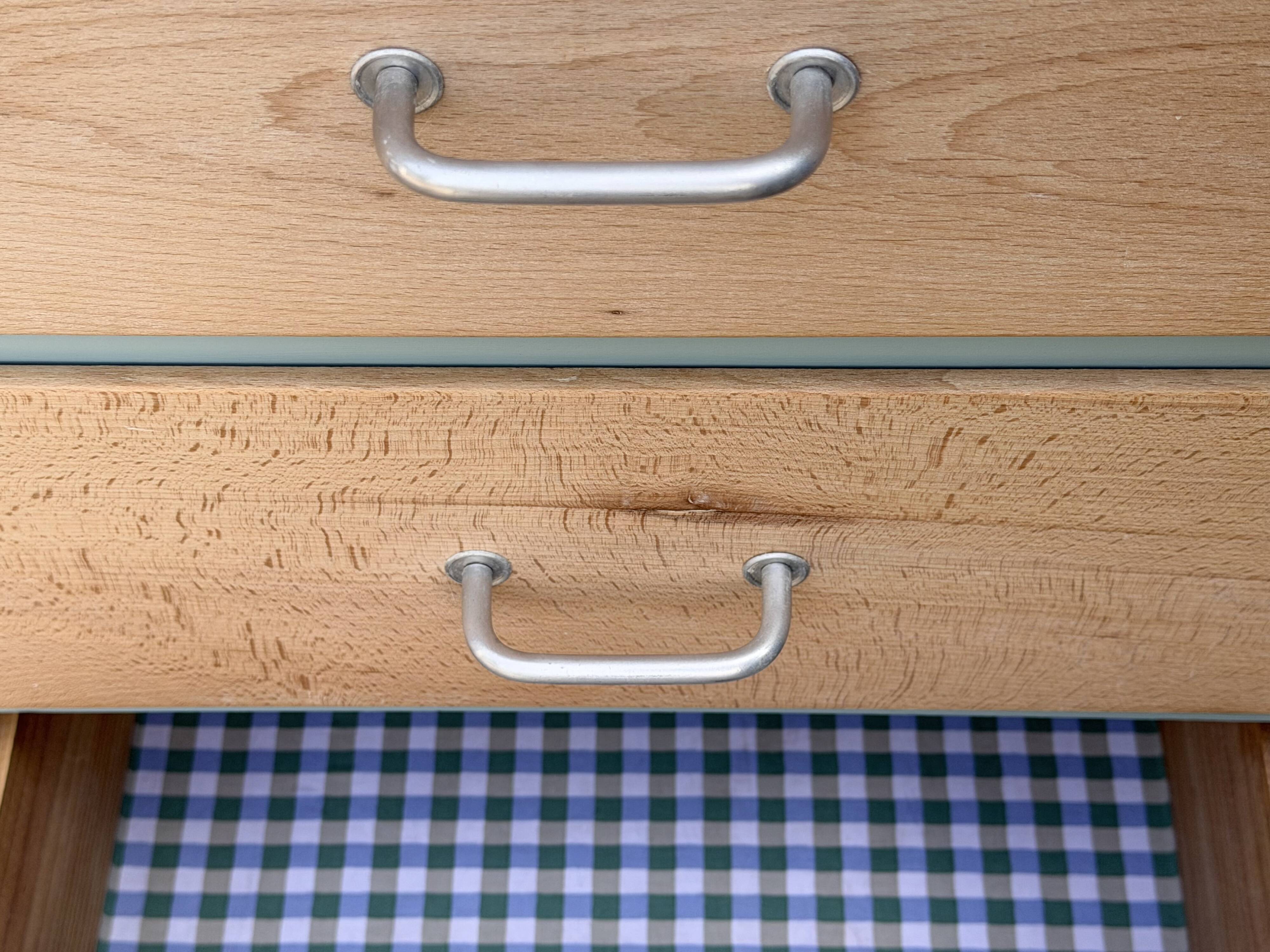 Vintage tall chest of drawers in raw wood and grey-blue from the 1950s.