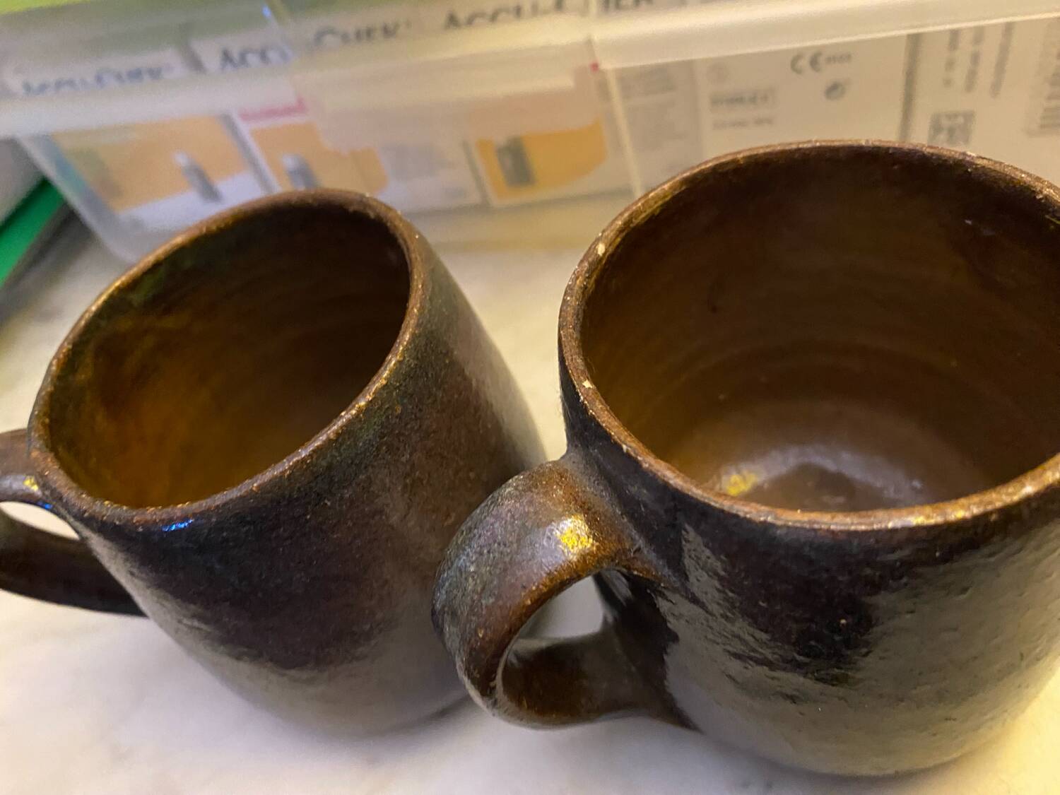 Sets of signed glazed stoneware mugs