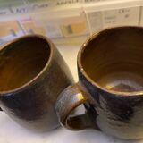 Sets of signed glazed stoneware mugs