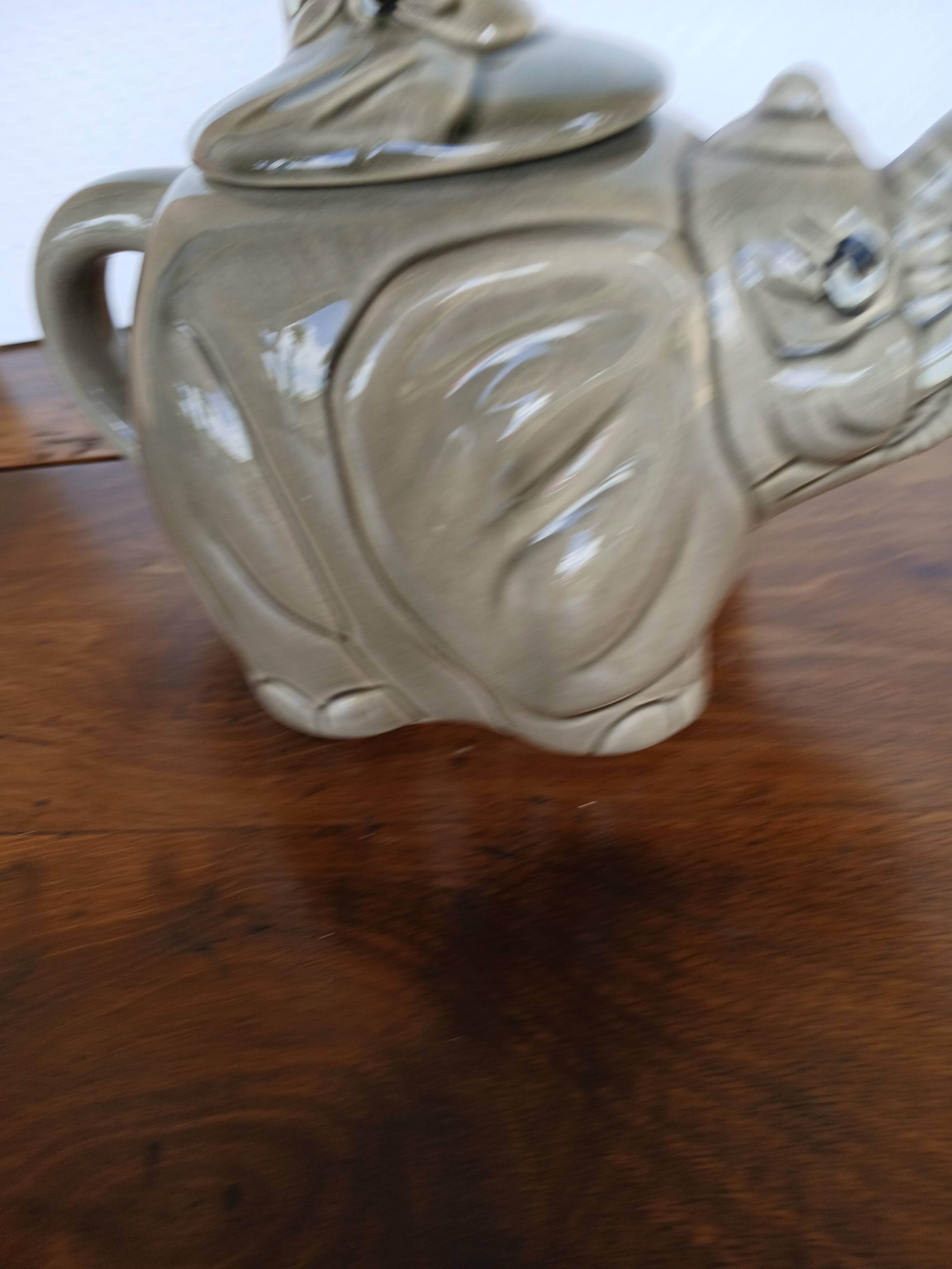 vintage ceramic teapot in the shape of a grey elephant