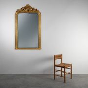 Baroque mantel mirror in carved wood and gilded plaster, France circa 1850.