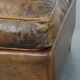 Sheepskin wing chair + XXL patinated footrest