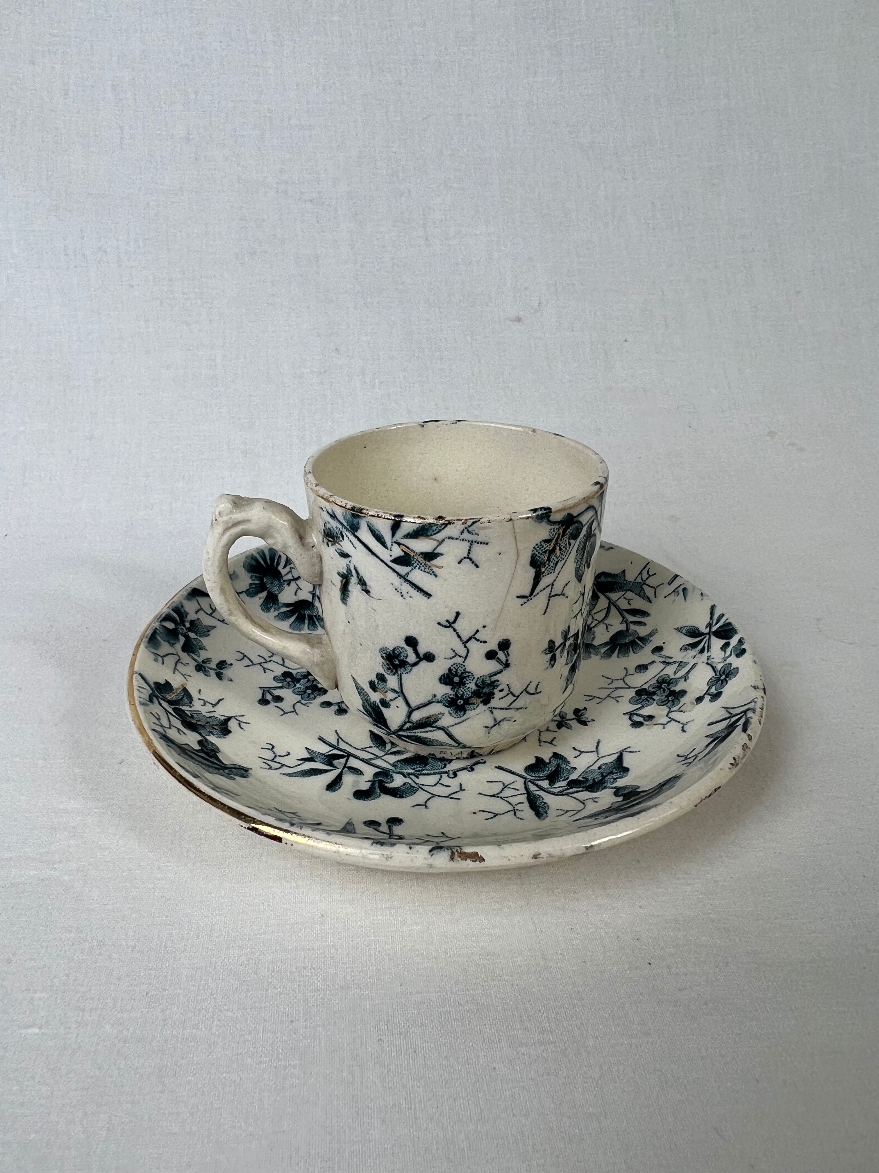 White porcelain cup with blue flowers