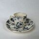 White porcelain cup with blue flowers