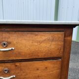Antique 19th-century wooden chest of drawers with a marble top
