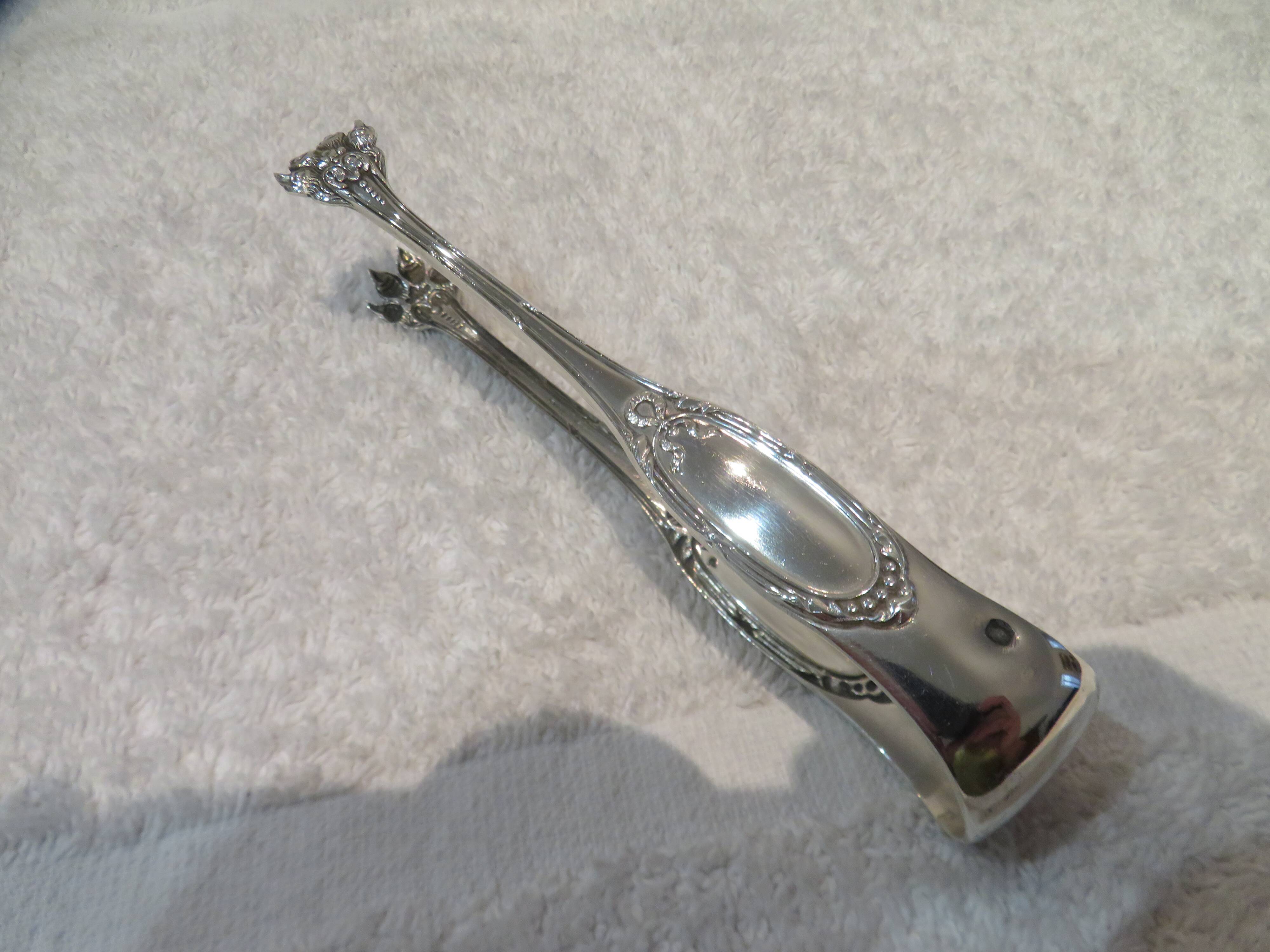 800 silver sugar tongs Minerva Louis XVI style goldsmith Pierre Bezon