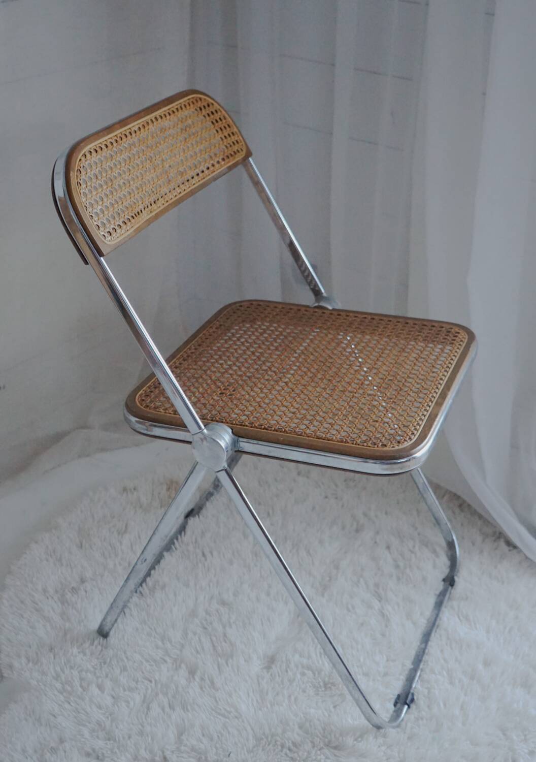Vintage design cane folding chair: Giancarlo Piretti