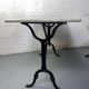 Set of two bistro tables in marble and wrought iron