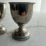 A set of two silver egg cups