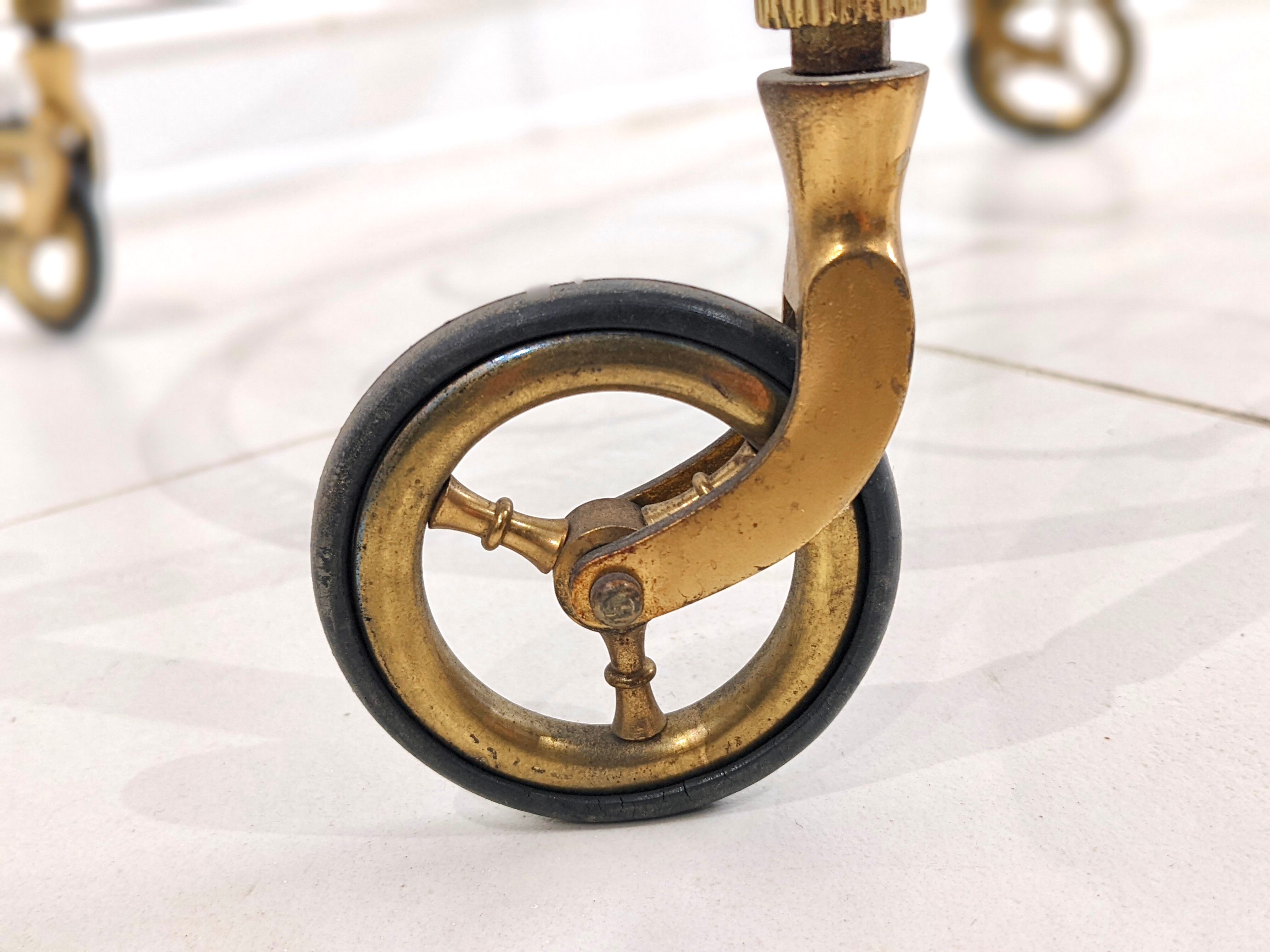 Golden metal dessert with glass tops