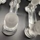 12 Baccarat crystal knife holders, Houdon model, 19th century.