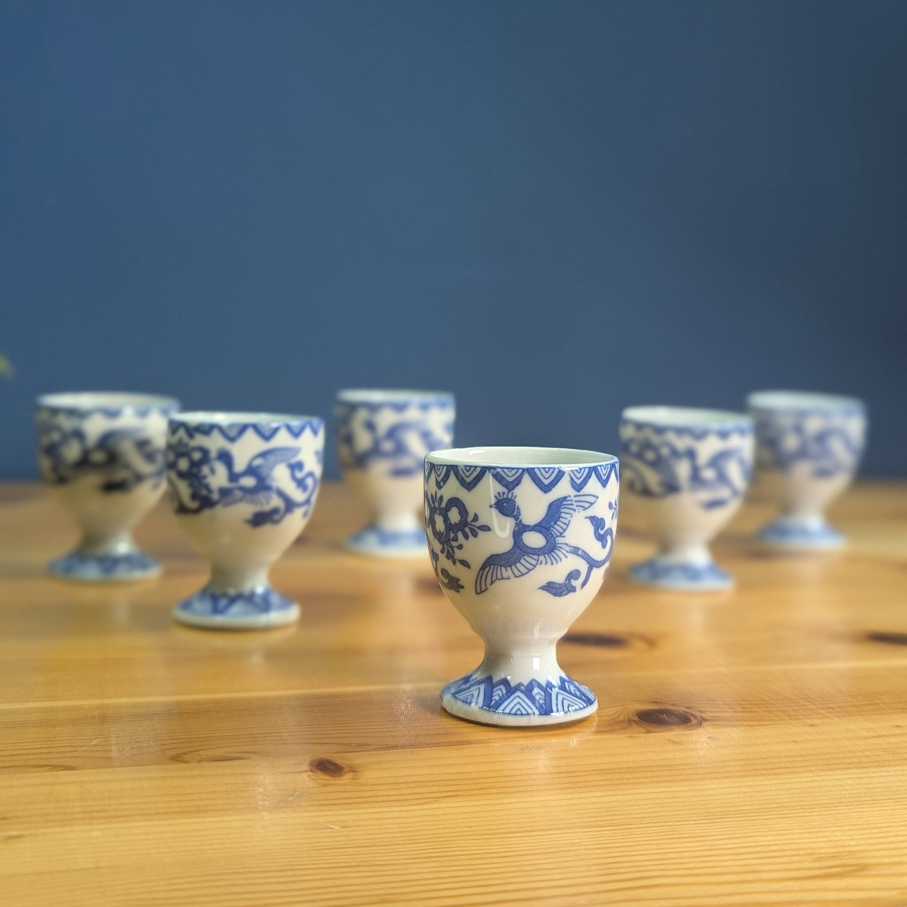 6 Japanese porcelain egg cups signed with blue bird flower geometry patterns