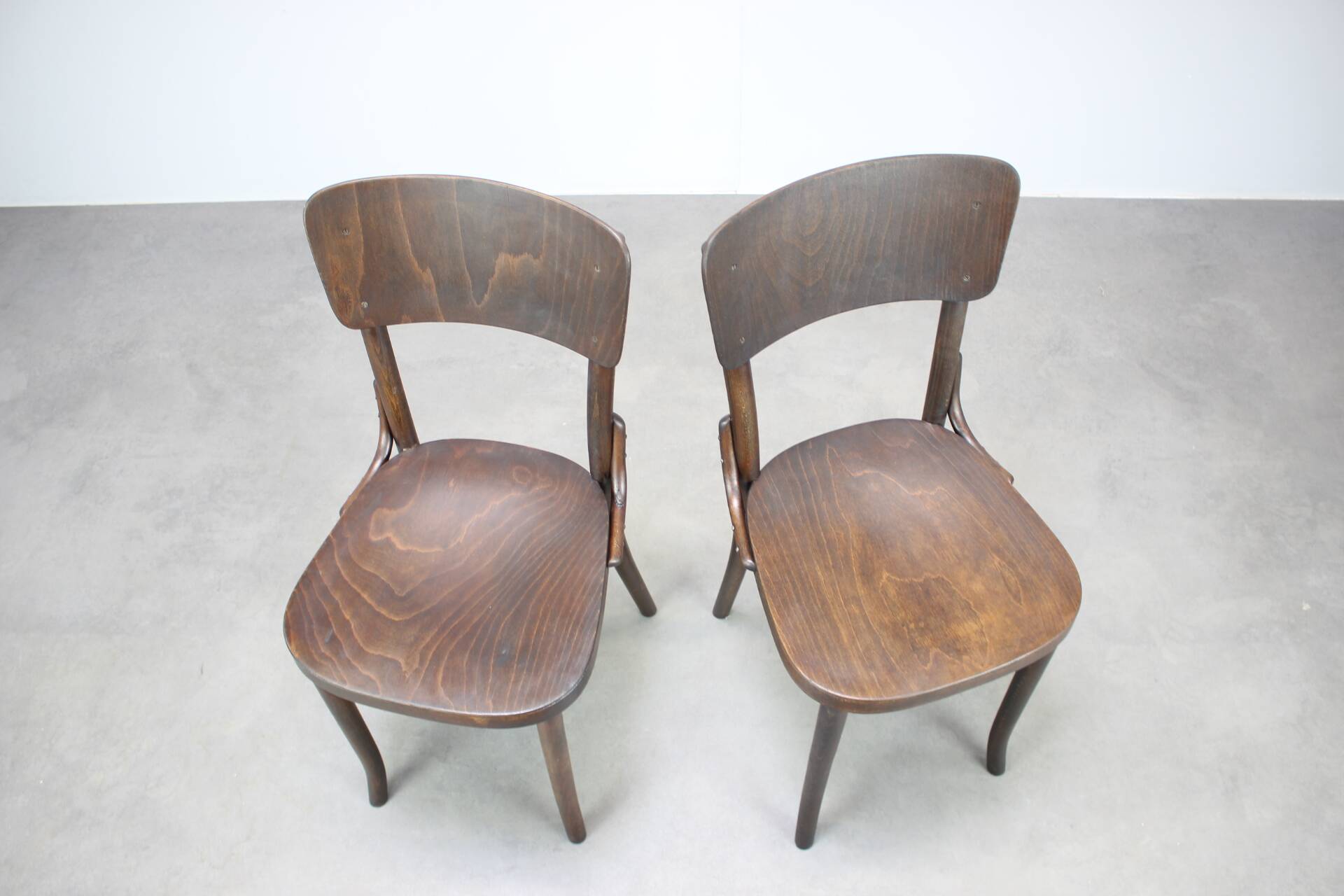 Pair of antique armchairs Model No B28 by Thonet, bent wood and caning, Austria 1920s.