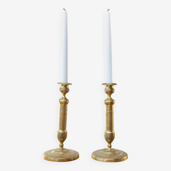 Pair of chiseled bronze Restoration candlesticks