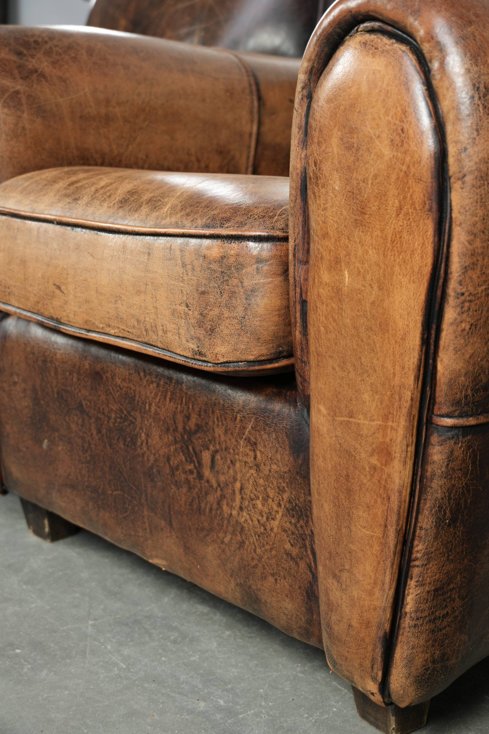 Set of two sheepskin Art Deco design armchairs with beautiful patina