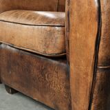 Set of two sheepskin Art Deco design armchairs with beautiful patina