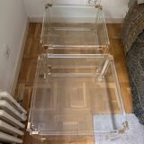 2 side tables in plexiglass, glass, and brass.