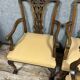 Pair of English armchairs with mahogany footrests circa 1850