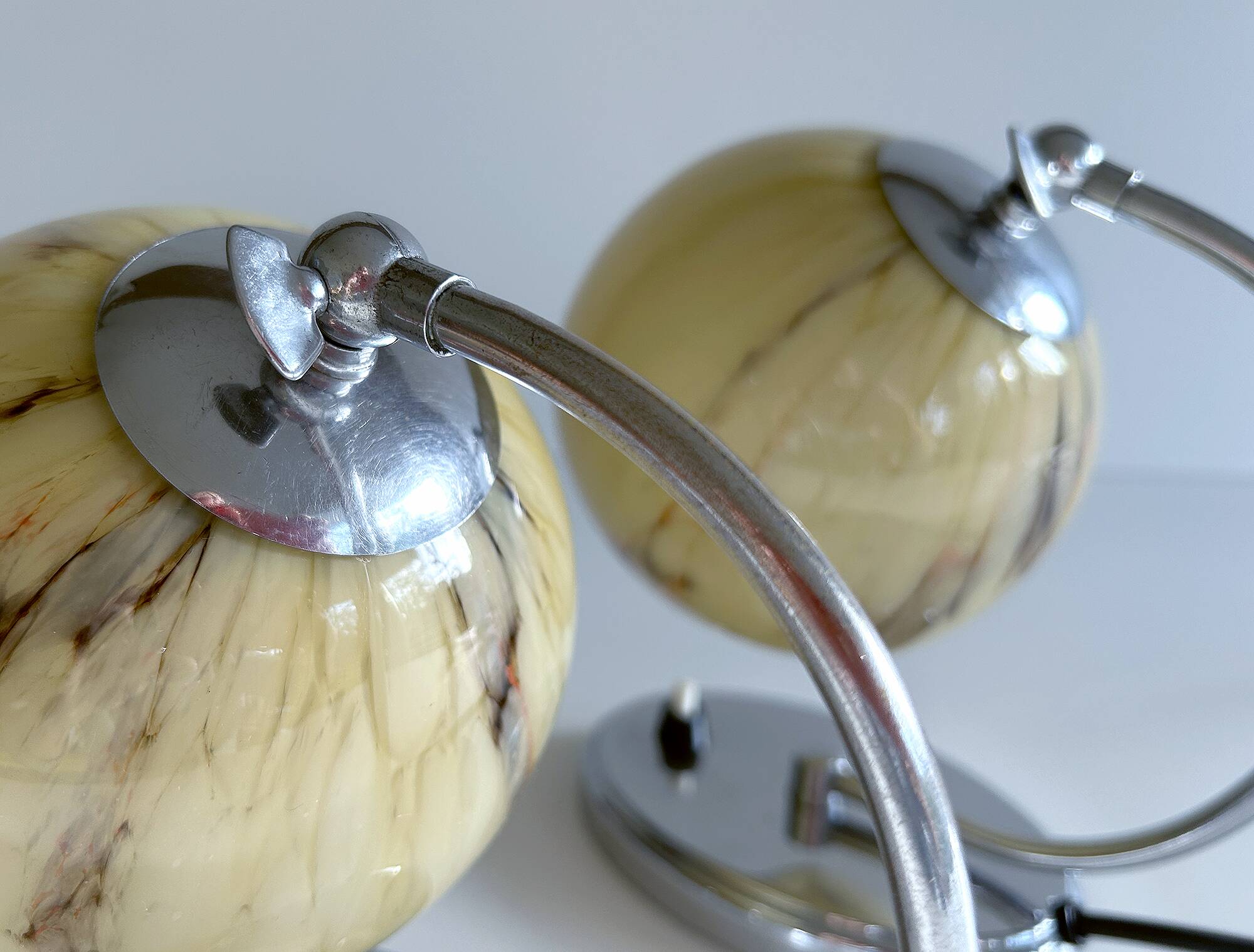 Pair of art deco lamps, chrome glass