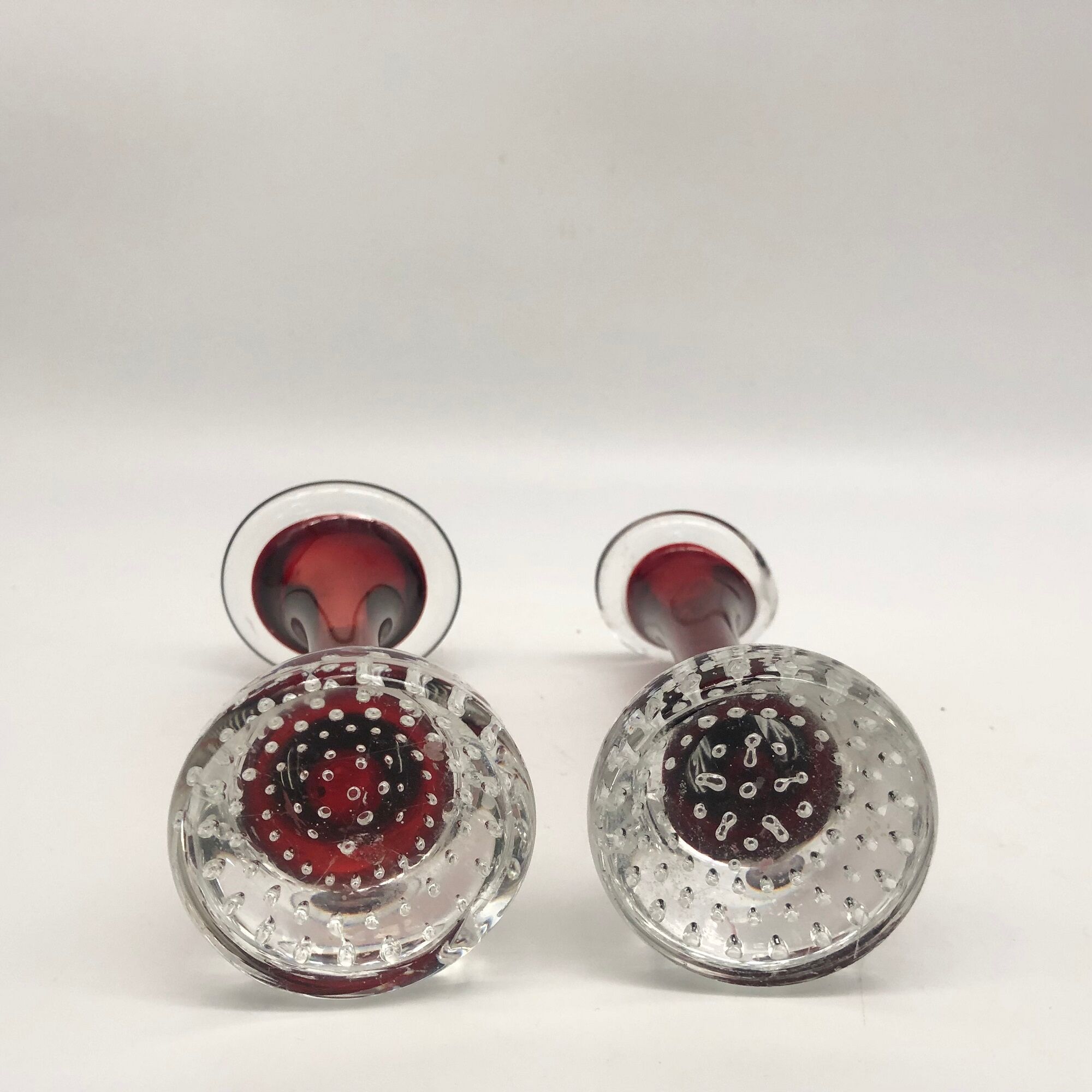 Duo of glass candle holders in the style of Murano