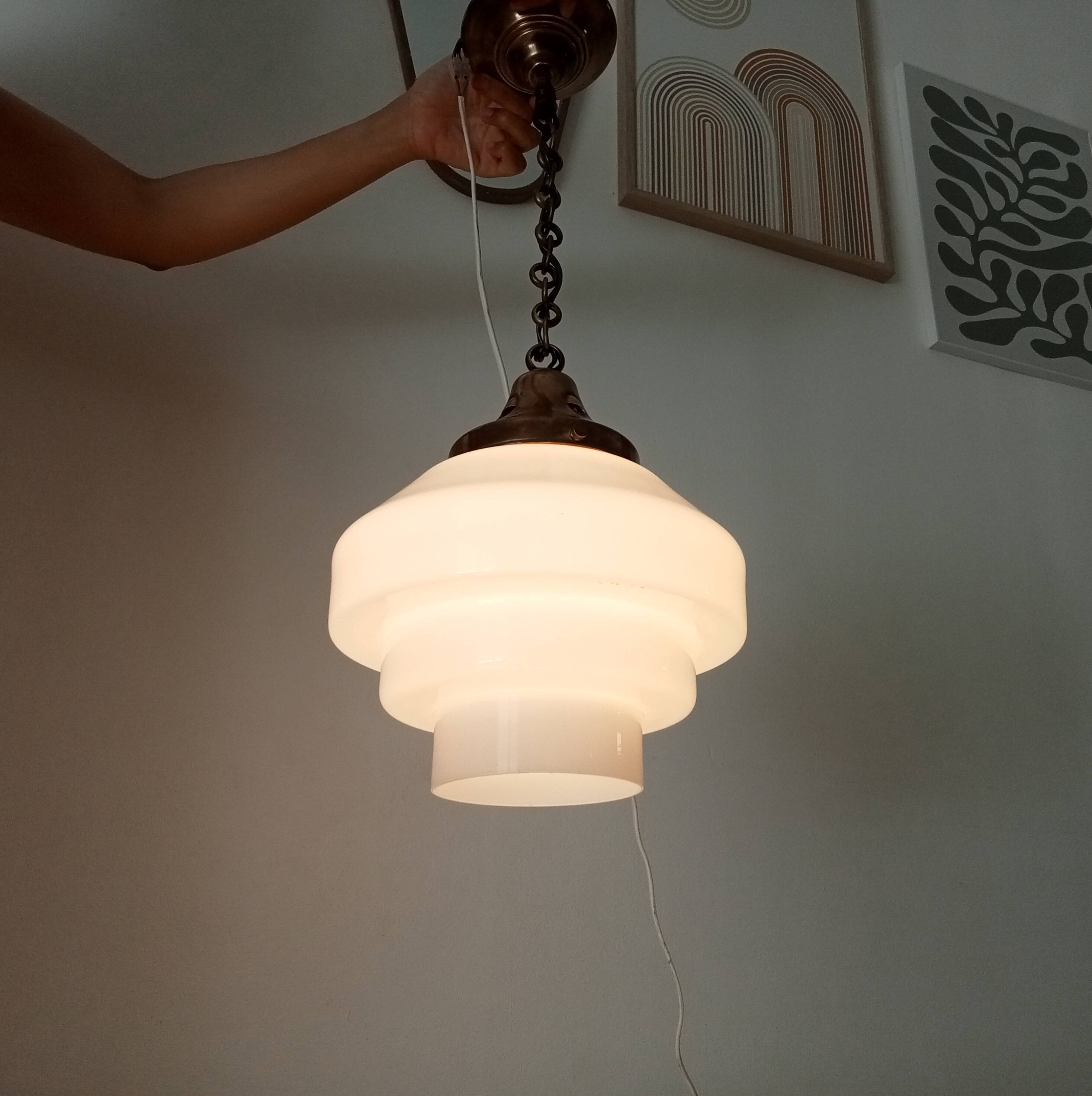 Art Deco "Skyscraper" suspension from the 1930s in opaline and brass.