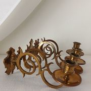 Pair of antique wall-mounted brass candle holders