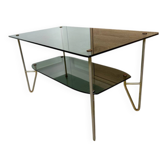 1975 glass coffee table with 2 tops, good condition
