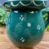 Green glazed ceramic jug