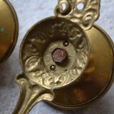 Three coat hooks with brass hook