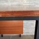 1960s modernist desk in wood and black metal, model CM172 by Paulin for Thonet.