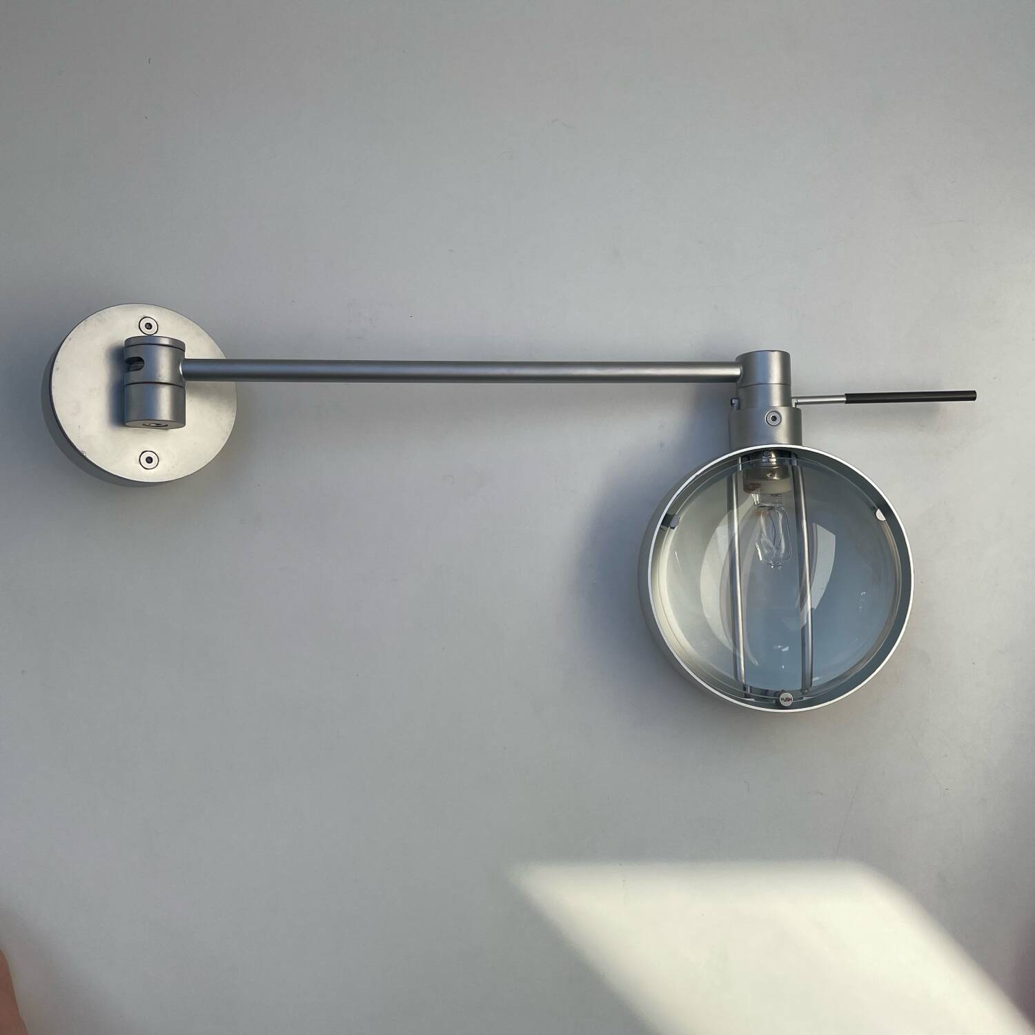 Wall lamp with arm Sento Occhio