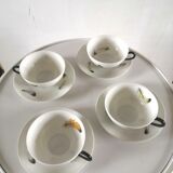 4 cups and cups in fine Limoges porcelain signed LC 60s