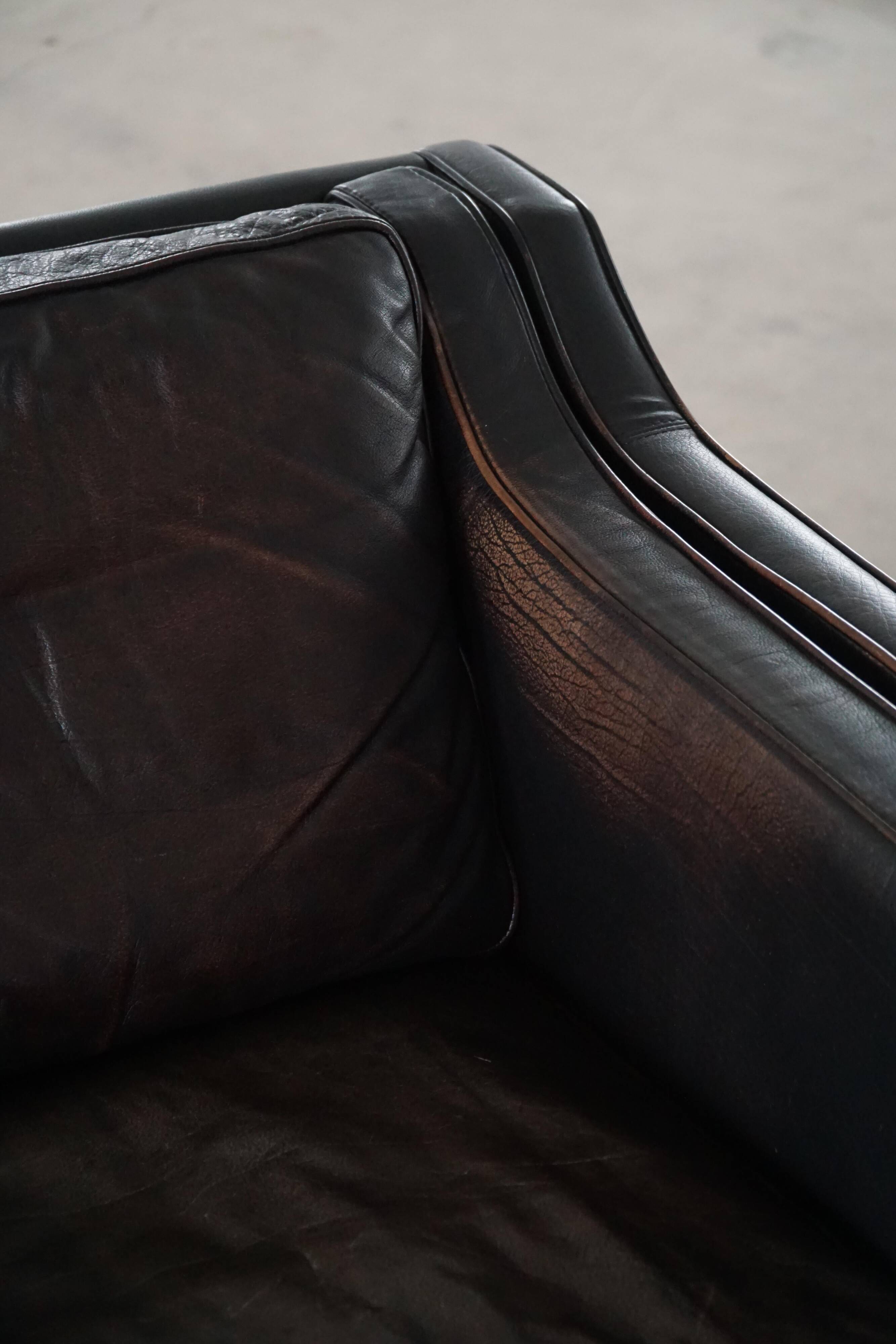 Mogens Hansen, 2-seater canapé mid-century, patinated black leather, 1970s.