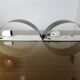 Pair of "SCE" half-moon-shaped band sconces 1980