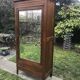 Armoire bonnetière Art Déco à miroir biseauté 1930/1940