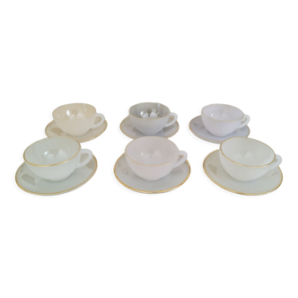 Coffee cups and iridescent opal glass under cups vintage