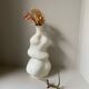 White stoneware vase in an organic shape