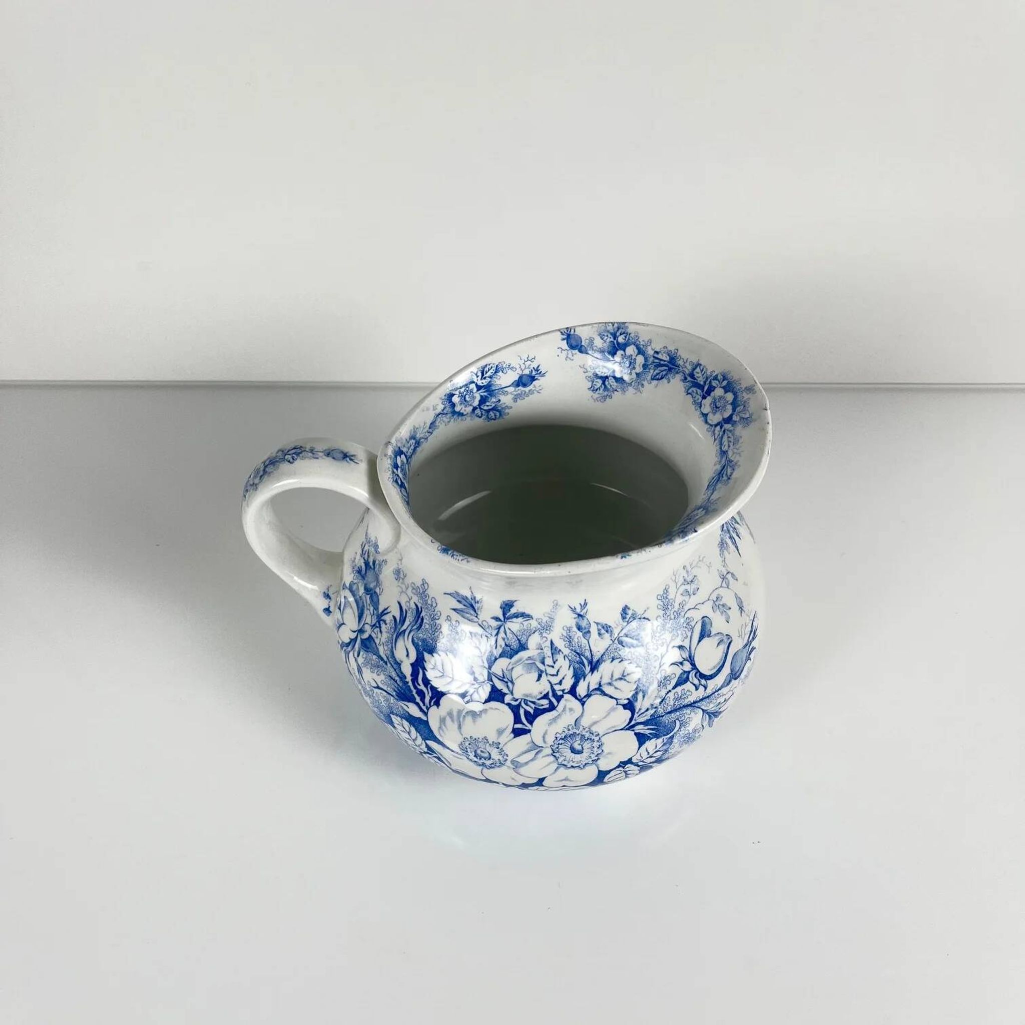 Chubby pitcher, old toilet jug KG Lunéville, blue flower pattern, late 19th to early 20th century.