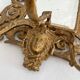 Bevelled mirror wall sconce in gilded bronze with 3 candle holders.