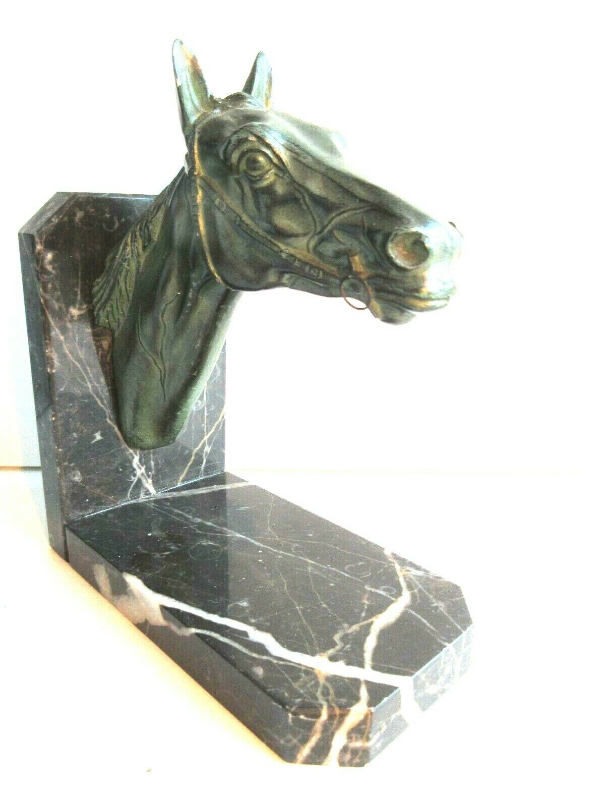 Art-Deco bookend Horse in patinated regulation on black marble support