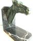Art-Deco bookend Horse in patinated regulation on black marble support